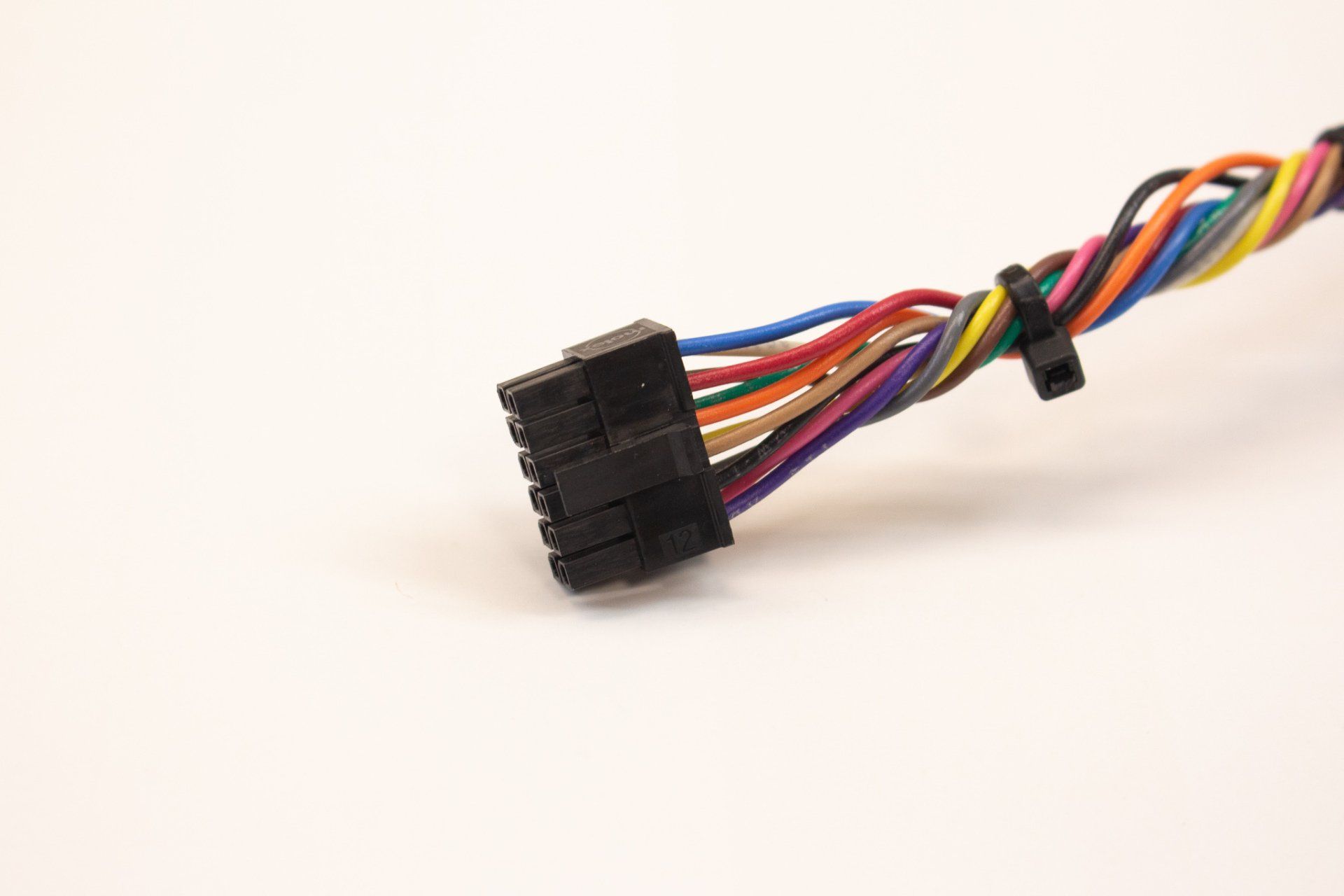 A bunch of wires are connected to a black connector