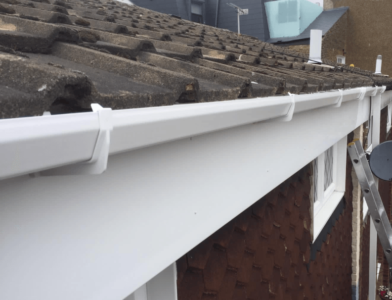 Picture of a new white PVC fascia and gutter fitted by Roofers London.