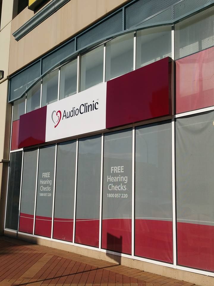 A building with a sign that says audio clinic on it — Mountain City Signs In West Tamworth, NSW