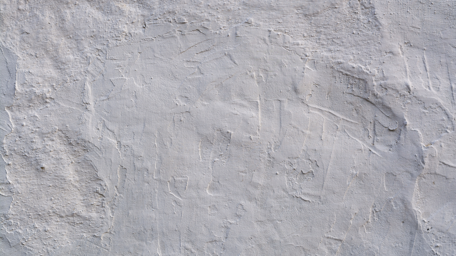 Textured light gray wall with subtle patterns and variations.