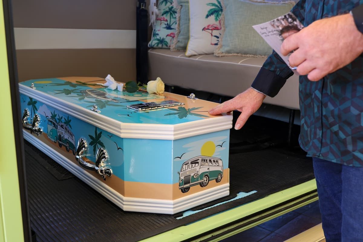 a coffin with a picture of a van on it - Funeral Services in Upper Coomera, QLD