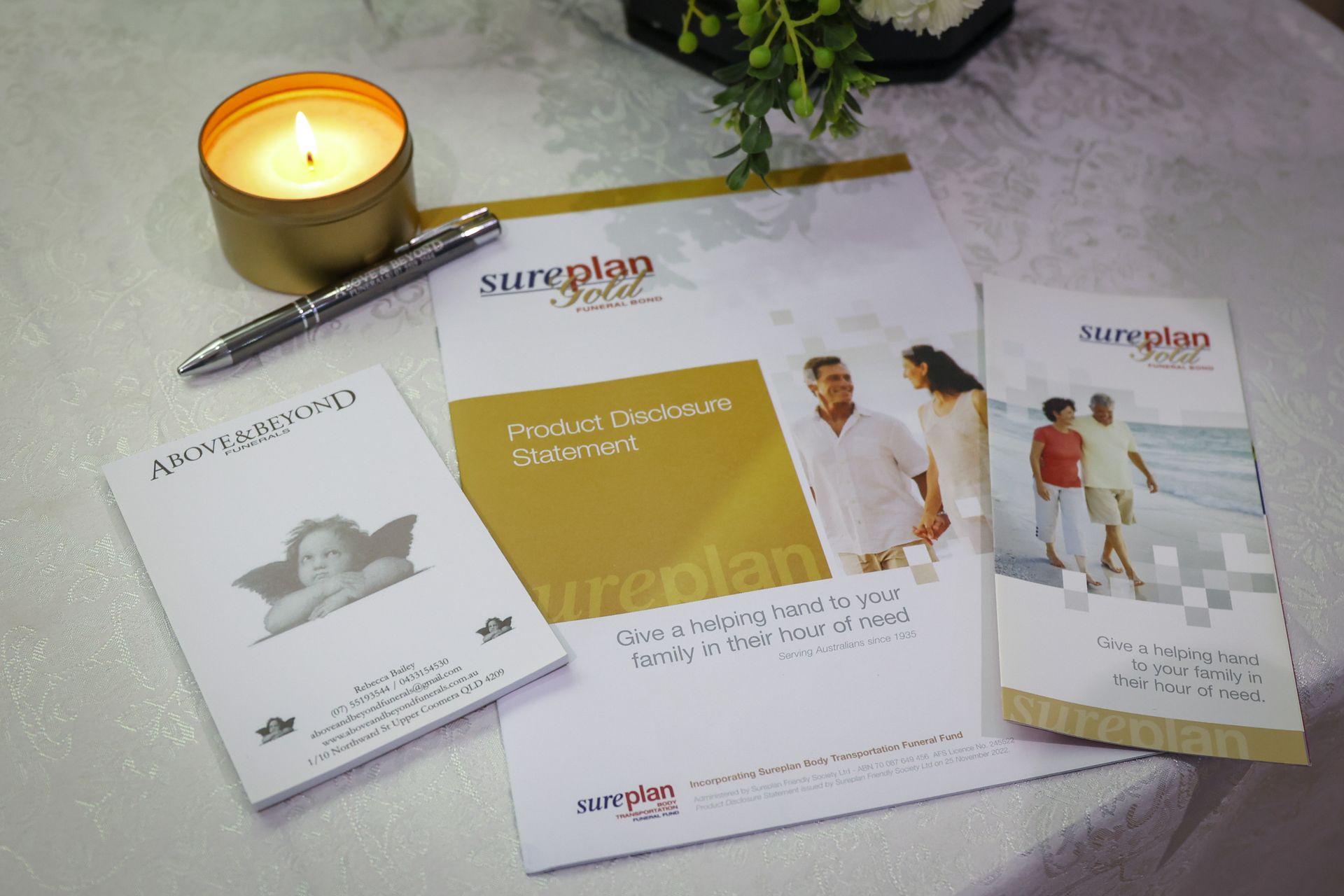 A man carrying a coffin with a shirt that says ' sydney ' on it - Funeral Services in Upper Coomera, QLD