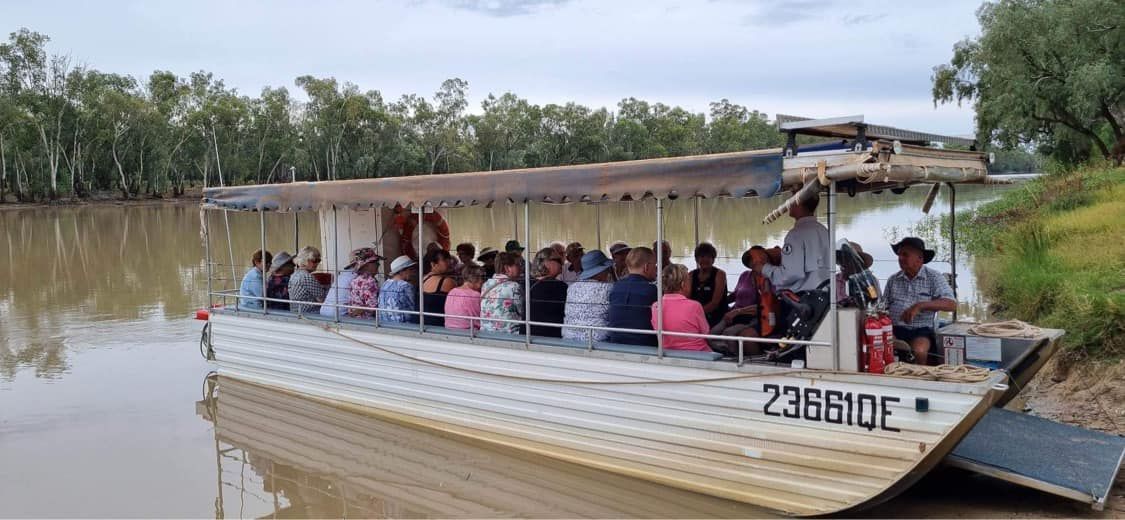 Tourists Riding a Boat — Queensland, AUS — Down Under Tours