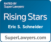 The logo for rising stars eric s. schneider is blue and white.