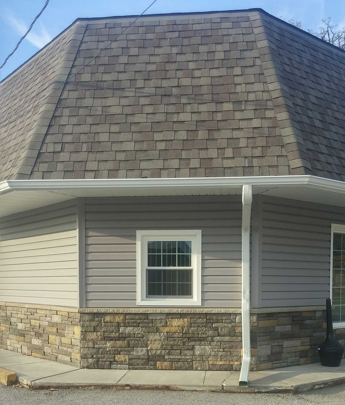 Lowell-Indiana-siding-stone-gutter-installtion