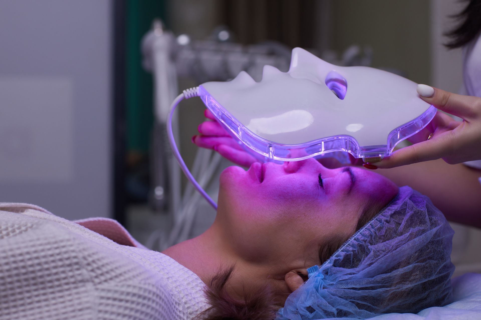 woman receiving LED light therapy treatment