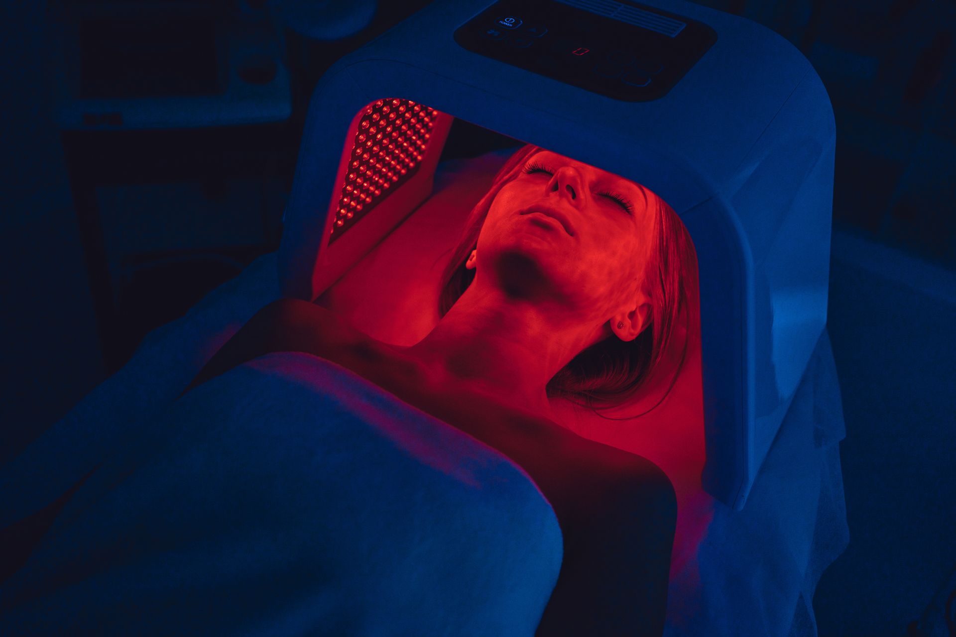 woman getting an led skin therapy