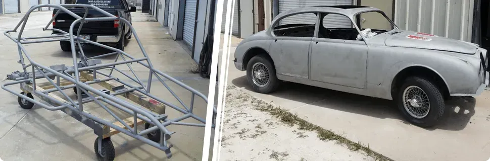 A car is sitting on the side of the road next to a trailer.