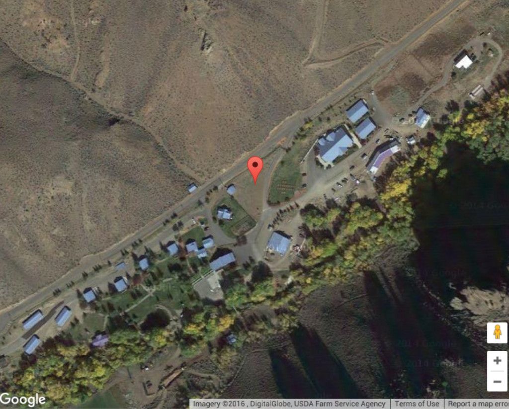 An aerial view of a small town on google maps