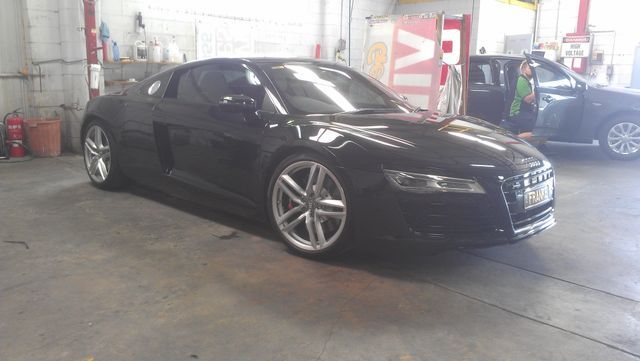 A Black Audi R8 Is Parked In A Garage Next To Another Car – Adelaide, SA - Sola Bloc Window Tinting