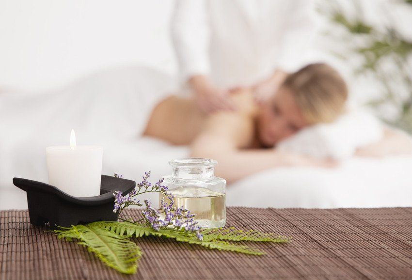 Young woman getting massage in spa