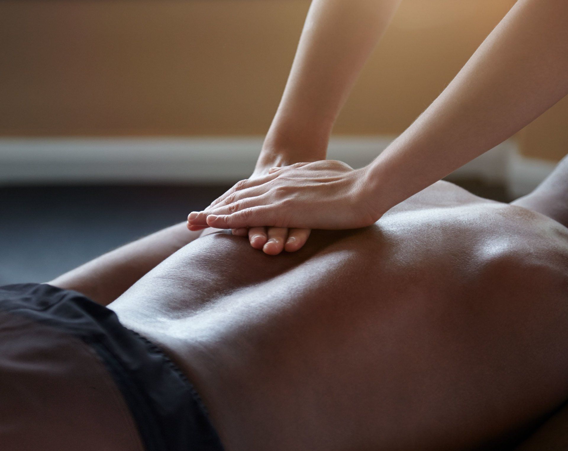 Shot of a back massage of male patient