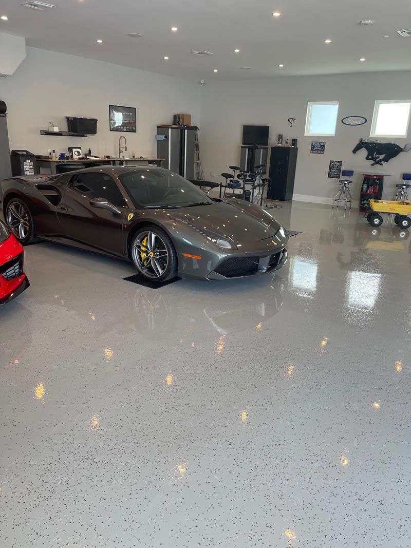Gray Car In Auto Shop — Debary, FL — All American Epoxy Flooring LLC