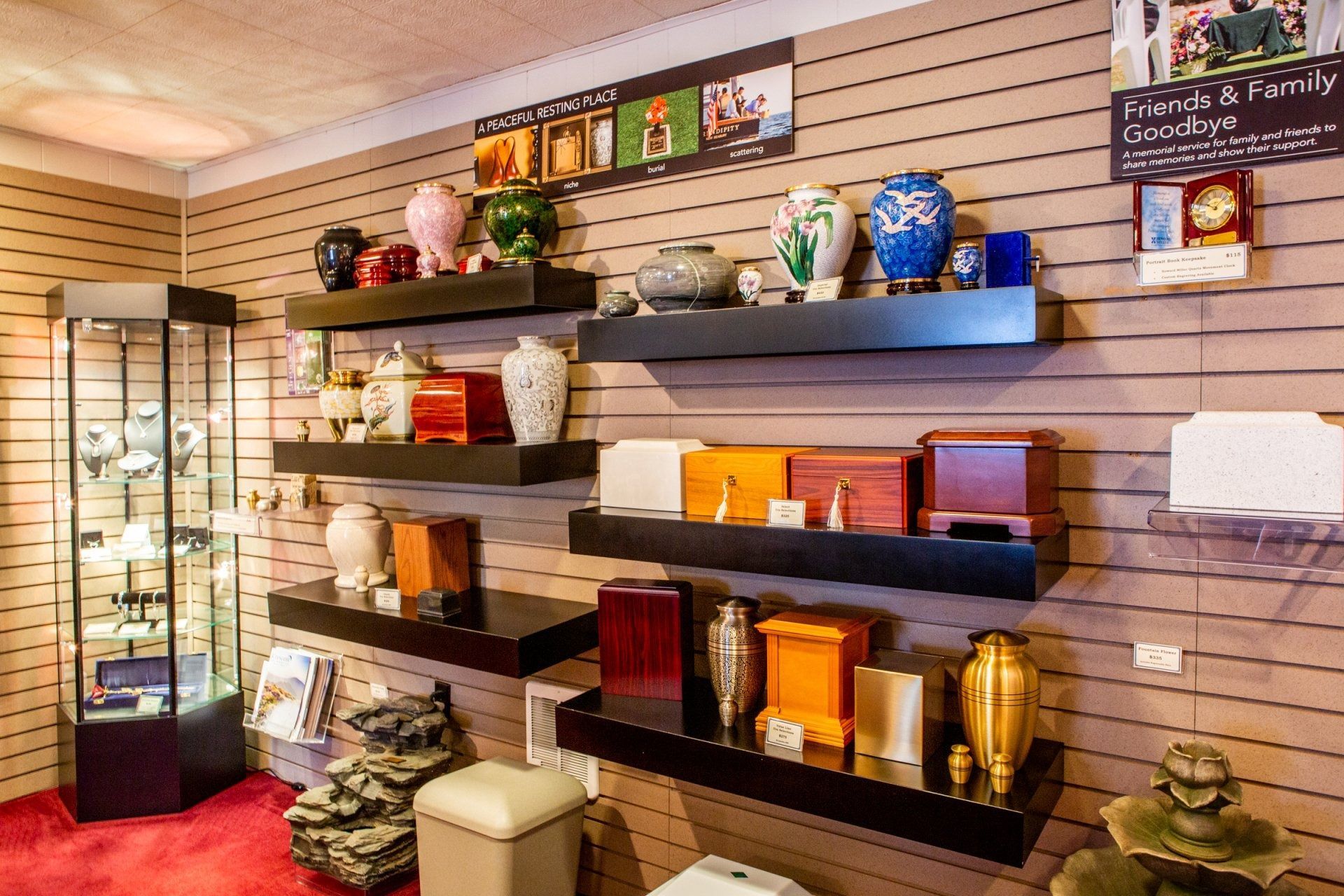 Gift shop display with shelves of candles, decorative vases, and home decor items