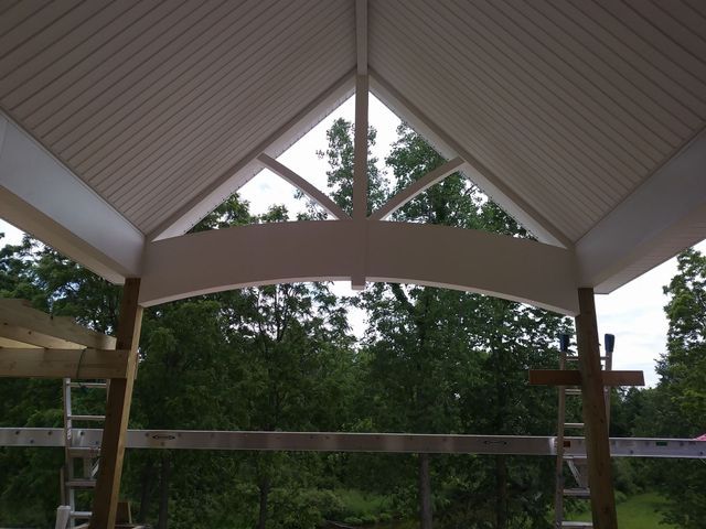 A roof with a triangle in the middle of it