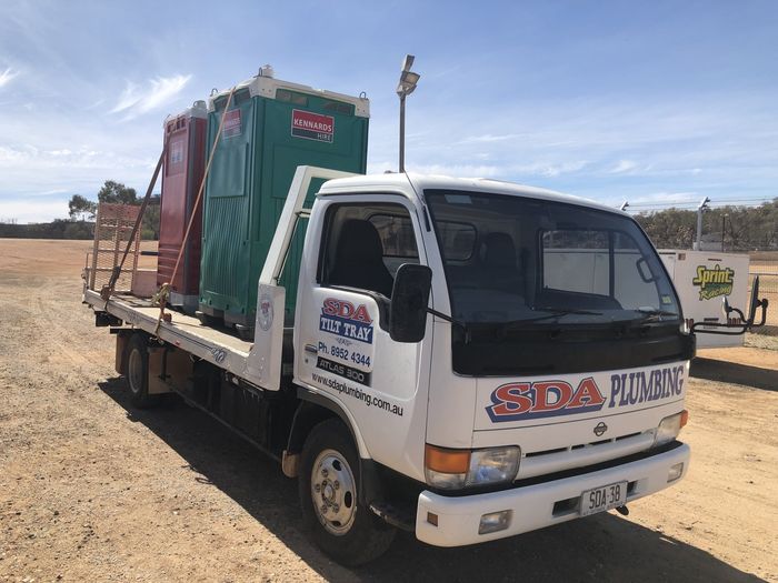 Truck with Portaloos — SDA Plumbing in Alice Springs NT