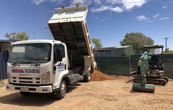 A Heavy Duty White Tipper Truck — SDA Plumbing in Alice Springs NT