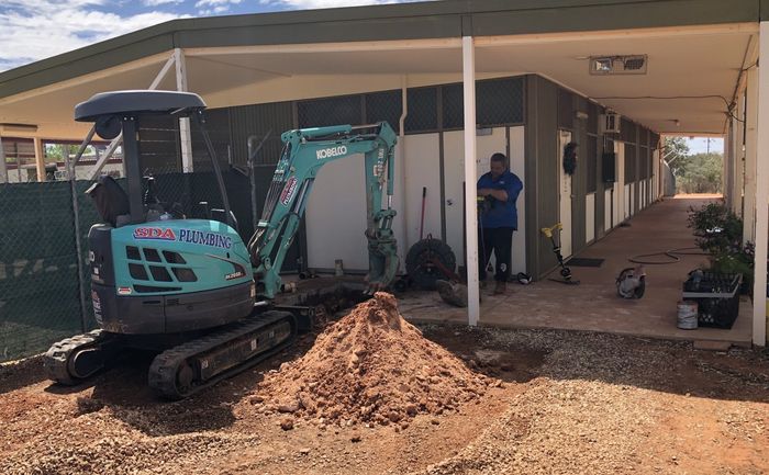 An Excavator — SDA Plumbing in Alice Springs NT