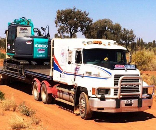A Large White Carrier Truck — SDA Plumbing in Alice Springs NT