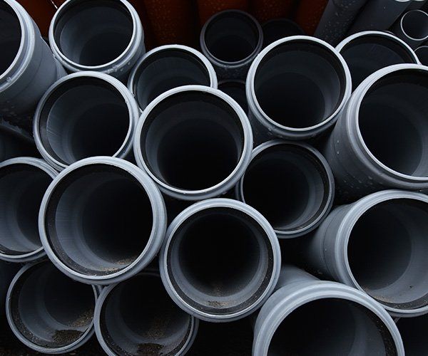 New Gray Plastic Pipes — SDA Plumbing in Alice Springs NT