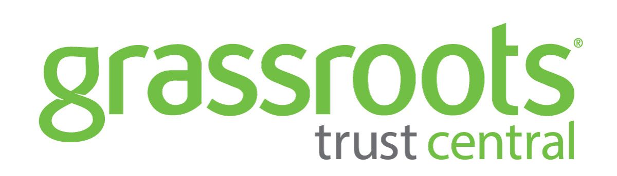 A green and white logo for grassroots trust central