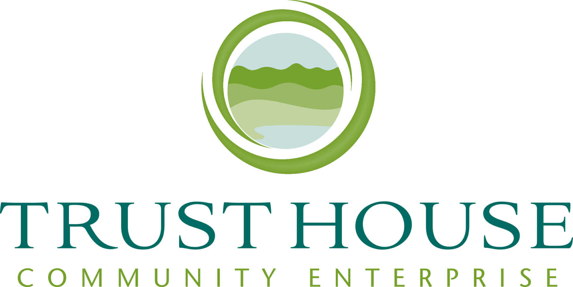 A logo for trust house community enterprise with a green circle and mountains in the background.