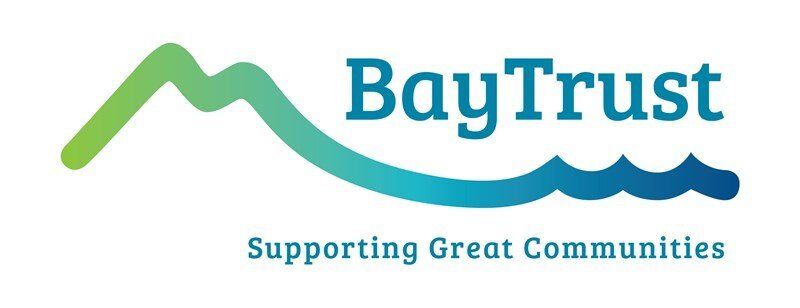 A logo for bay trust supporting great communities