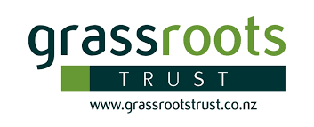 A logo for grassroots trust is shown on a white background