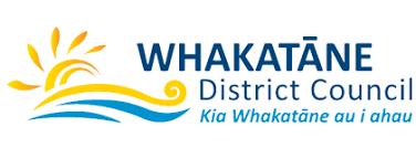 A logo for the whakatane district council with a sun and waves
