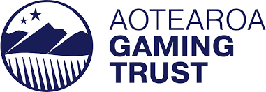 The logo for the aotearoa gaming trust is a blue circle with mountains and stars on it.