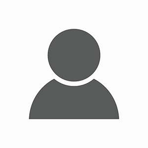 A gray icon of a person without a face on a white background.