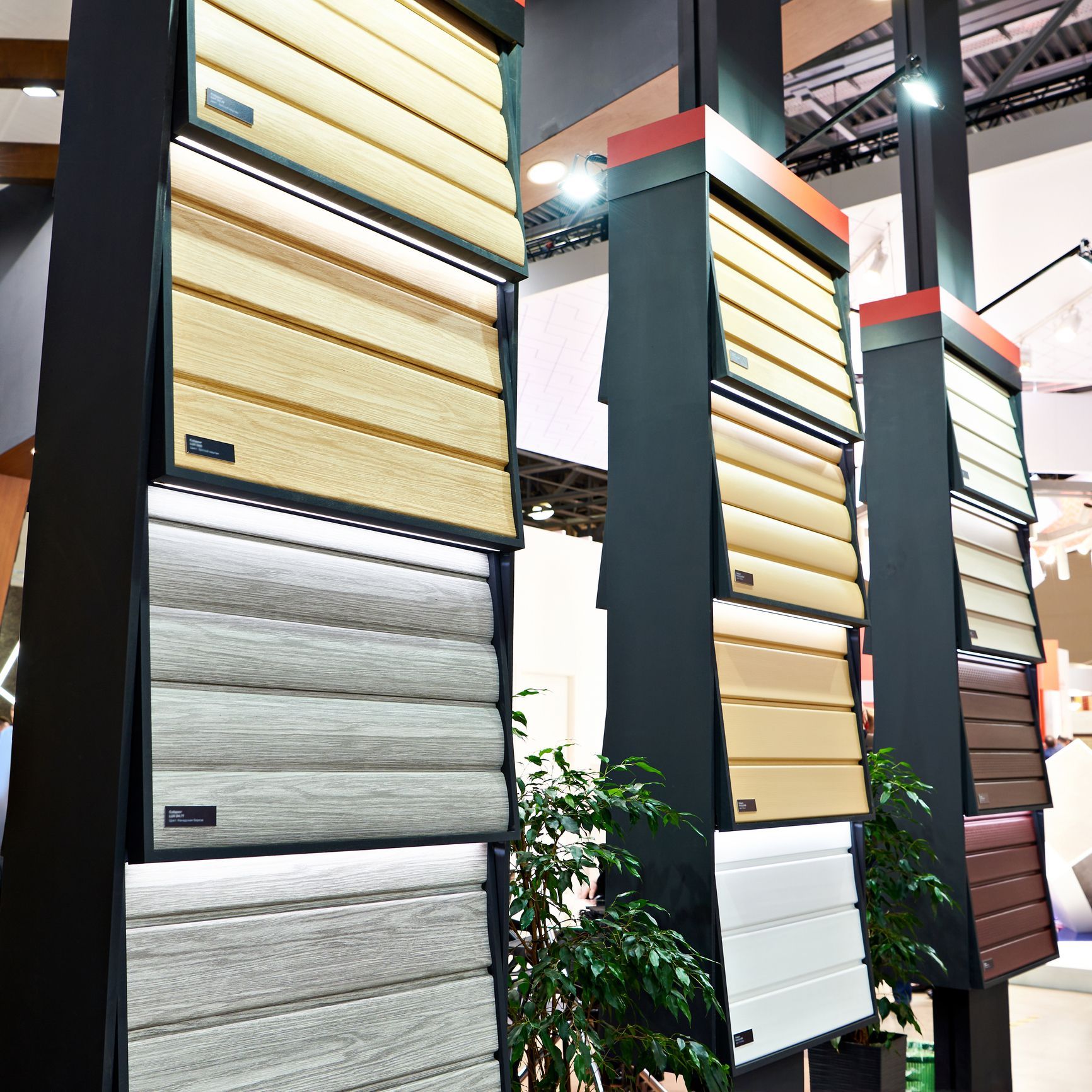 Display of various colored garage door samples.