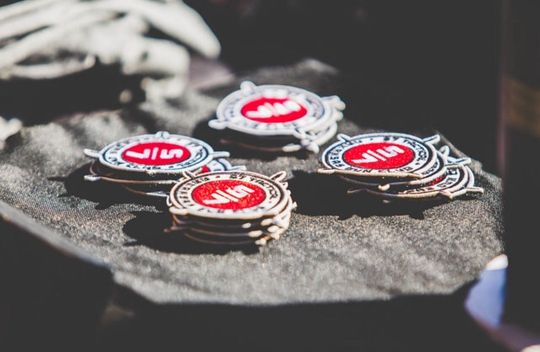 A stack of coins with the word jiu-jitsu on them