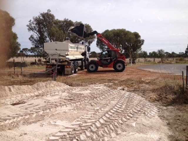 front loader loading truck