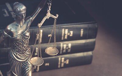 Lady Justice Mini Statue with Books — Attorney at Law in Leawood, KS