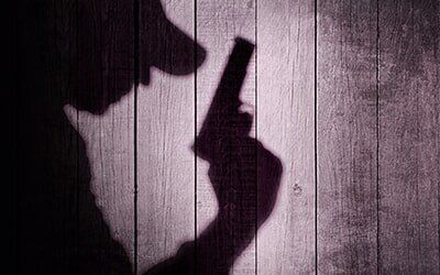 Silhouette of An Armed Man — Attorney at Law in Leawood, KS