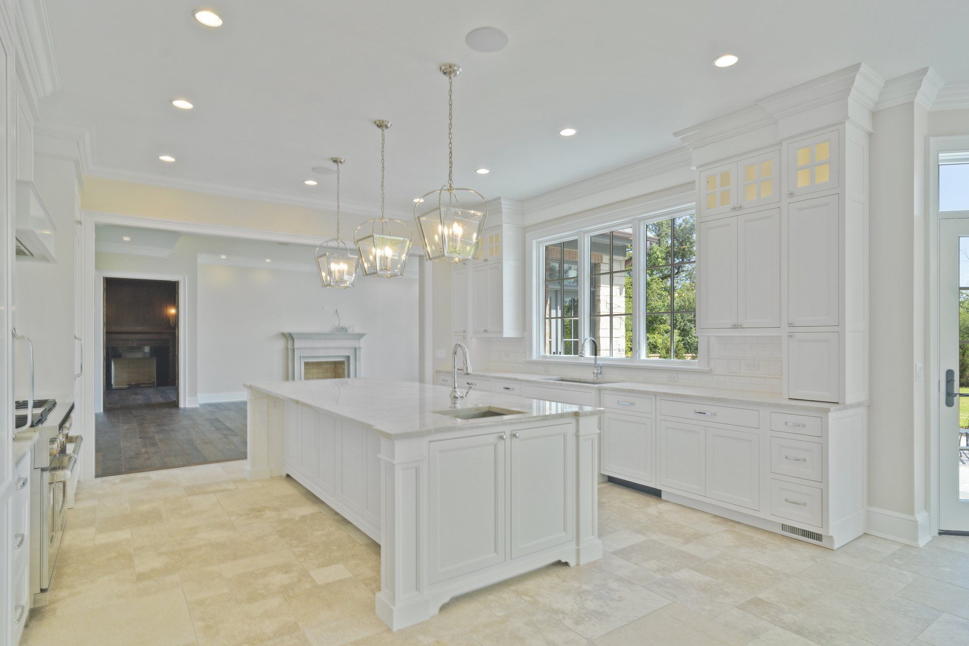 There is a large island in the middle of the kitchen.