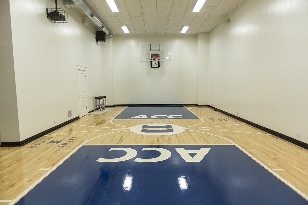 A basketball court with the word acc on it