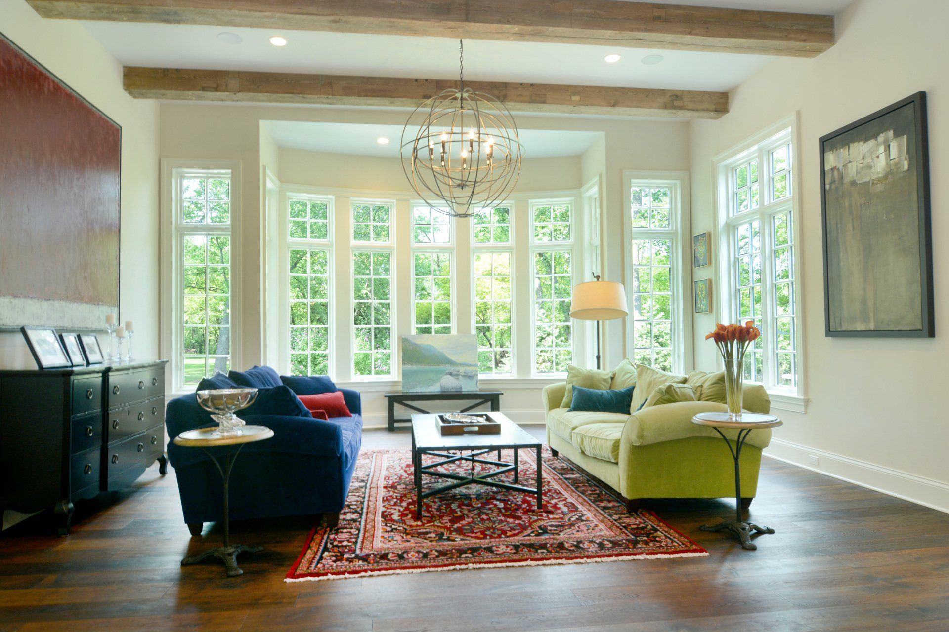 A living room filled with furniture and a chandelier