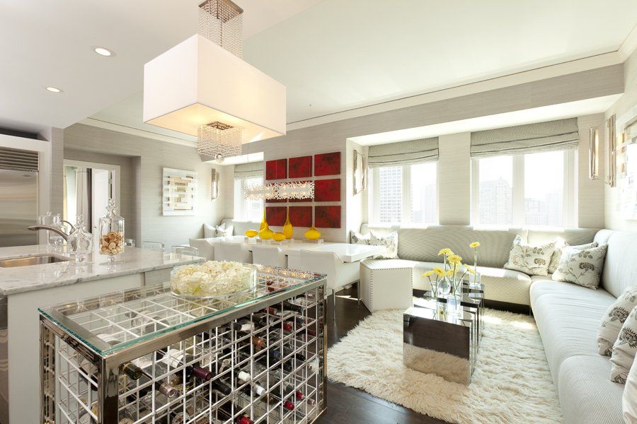A living room with a couch and a wine rack
