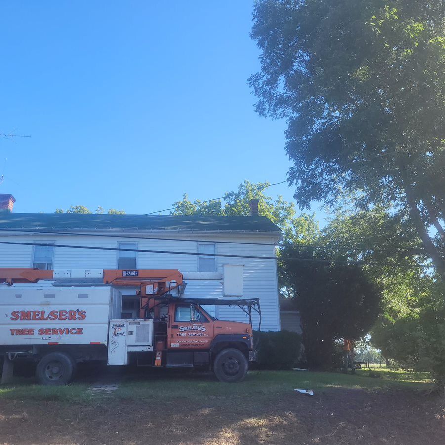 A truck with a crane — Cross Junction, VA — Smelser's Tree Service LLC