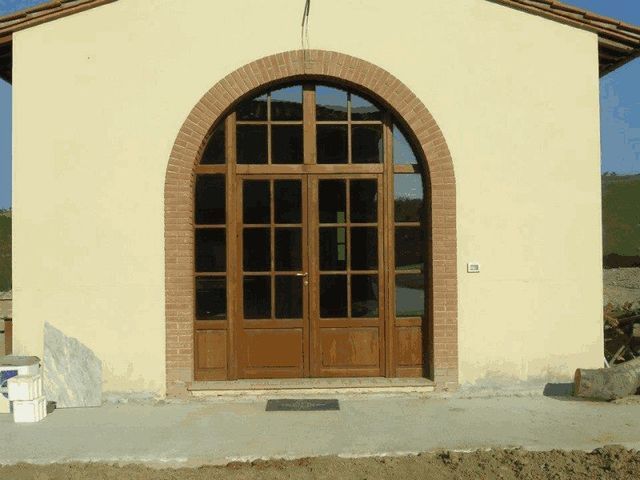 porta finestra in legno ad arco