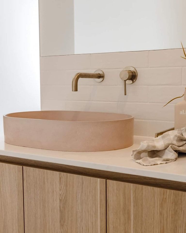A Bathroom Sink Is Sitting on Top of A Counter — VG Cabinets In Warrnambool, VIC