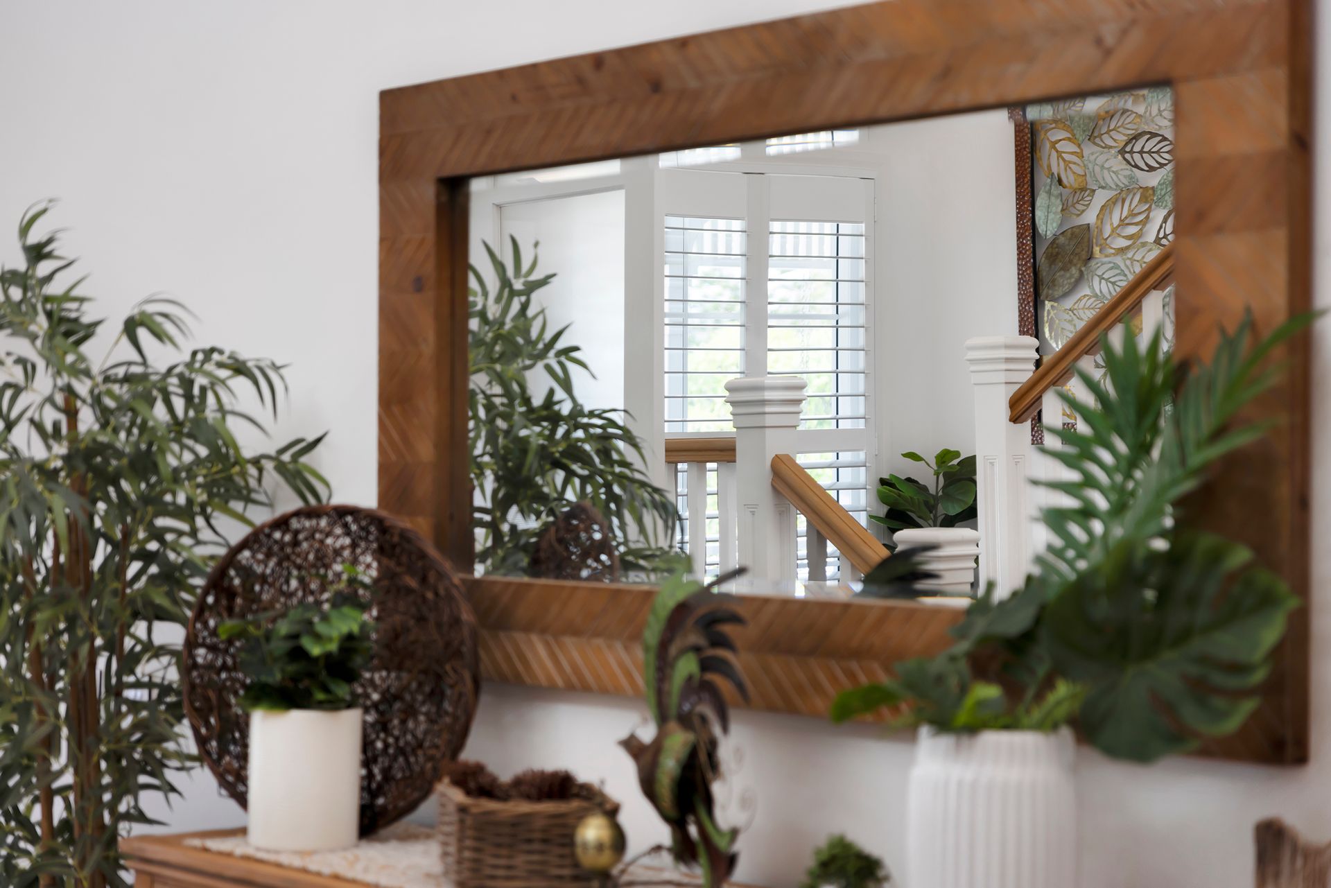 Large Wooden-framed Mirror Reflecting a Stairway — Wares Blinds, Screens & Awnings In Gladstone Central, QLD