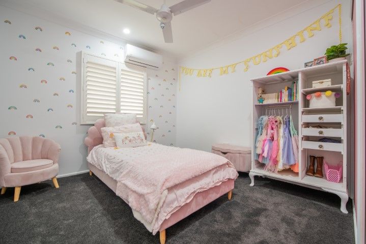 Pink Bedroom With Bed, Chair, Wardrobe, Rainbow Wallpaper — Wares Blinds, Screens & Awnings In Gladstone Central, QLD