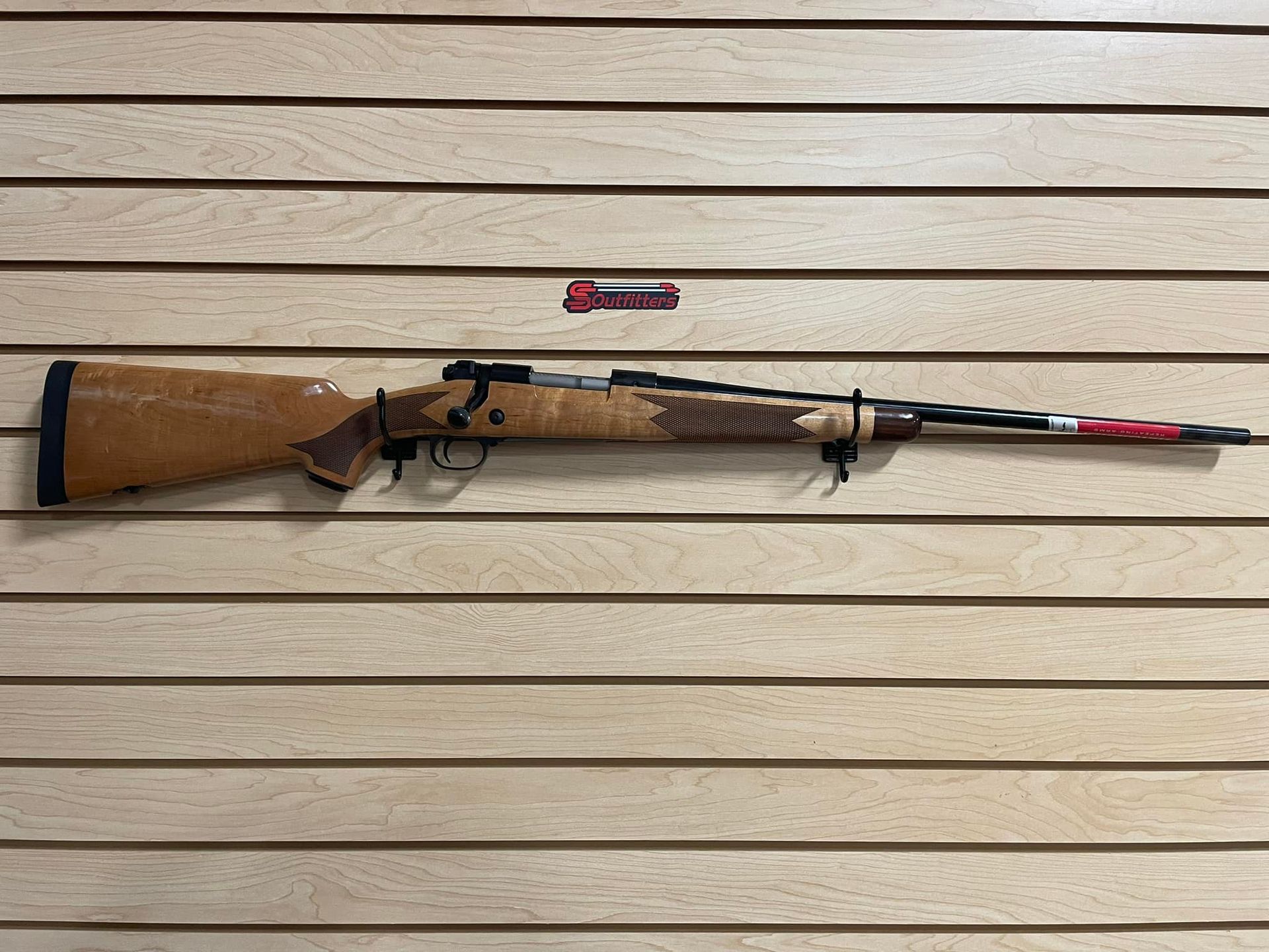 Gun hanging on the wall