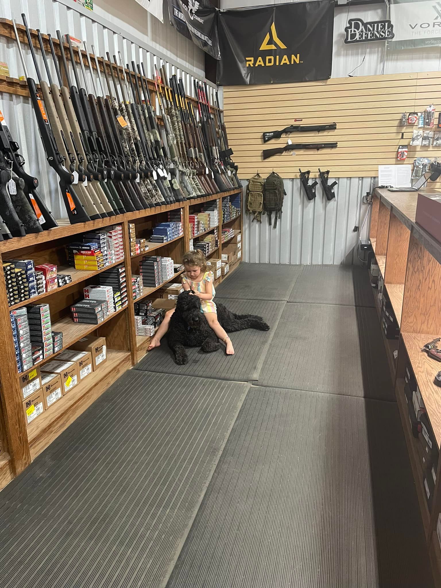 A store filled with lots of items and a yellow flag that says liberty