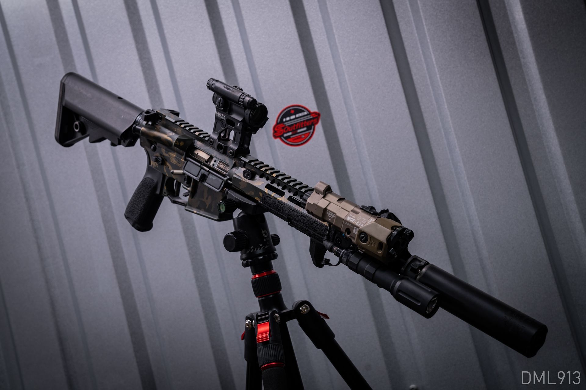 A gun hanging on the stand