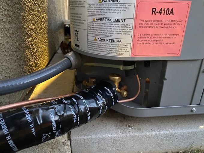A hose is connected to a r410a refrigerant