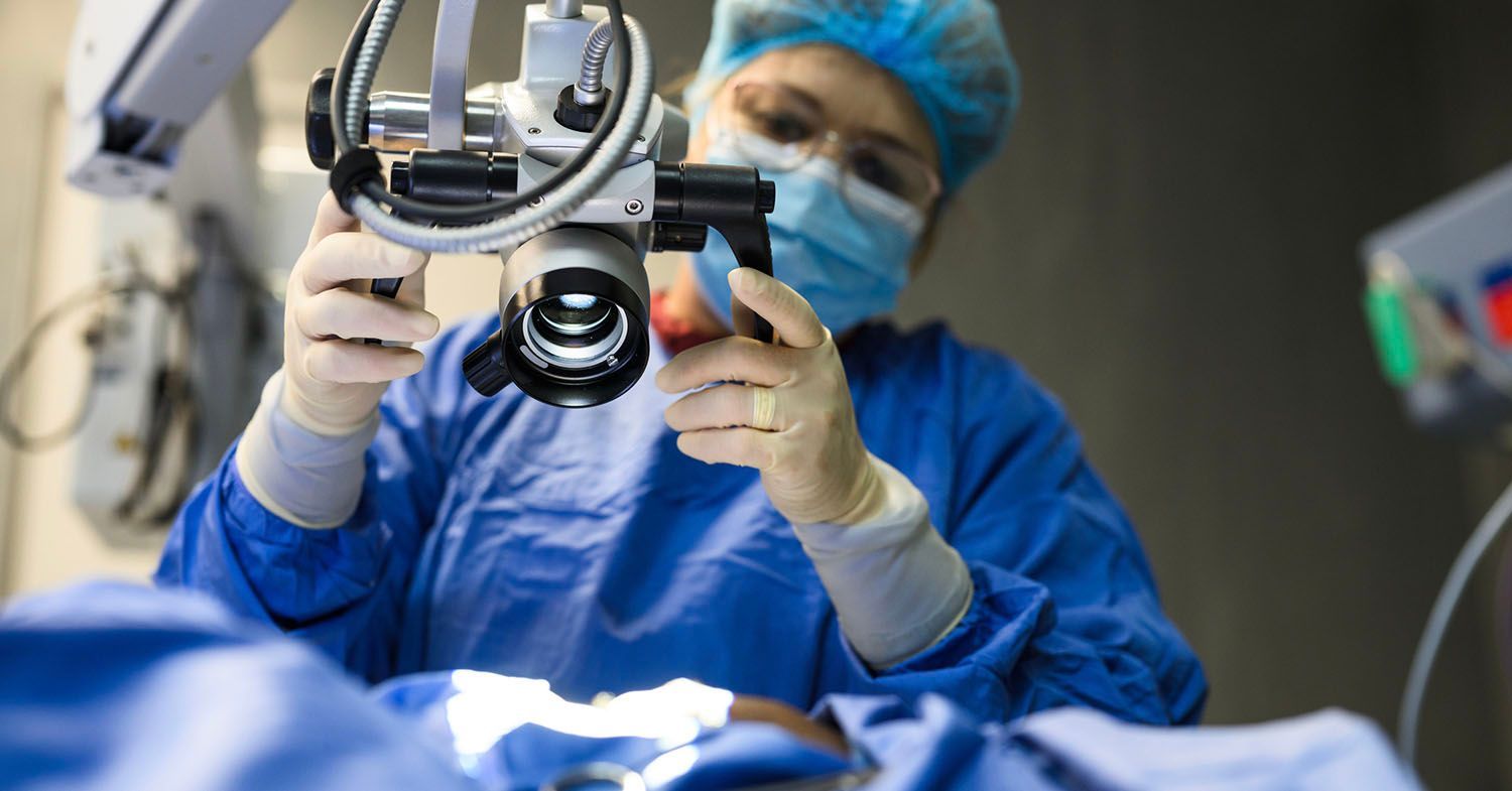 A radiologist or technician using advanced imaging equipment.